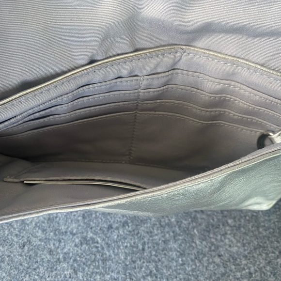 Coach Wristlet in Silver/Gold Depending on Lighting - Picture 5 of 13